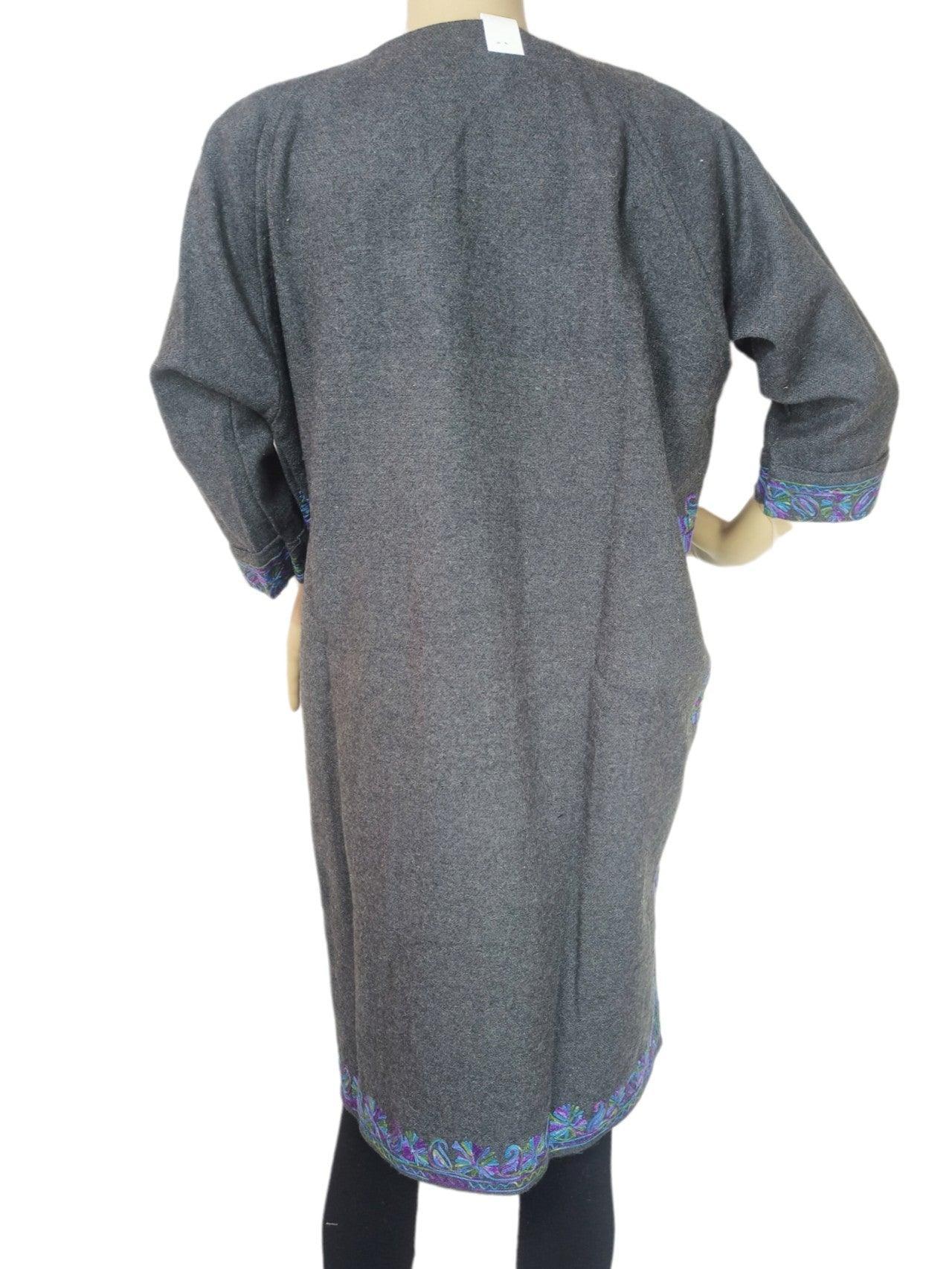 Back view of gray woolen long coat with colorful embroidered borders on sleeves and hem