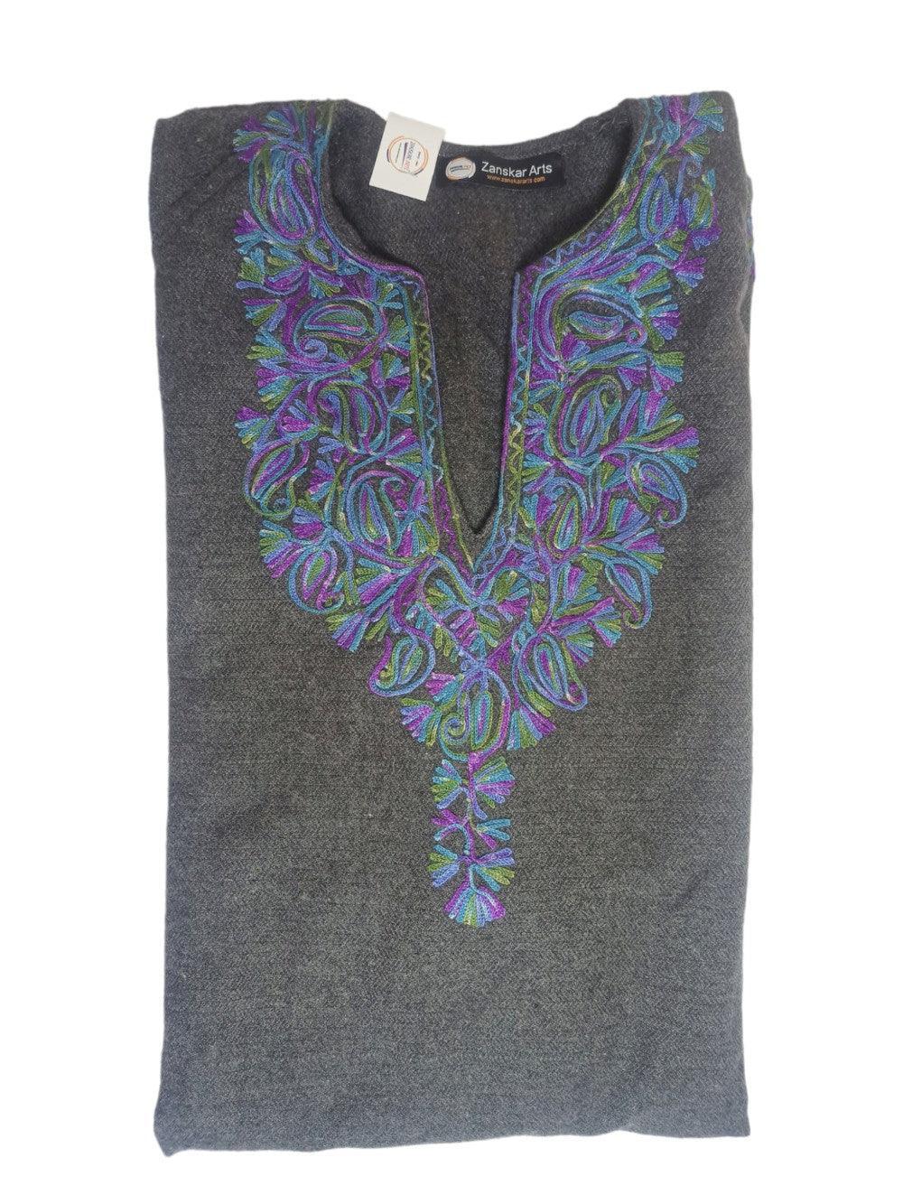 Gray woolen Pashmina shawl with intricate blue, purple, and green embroidery, folded with Zanskar Arts tag