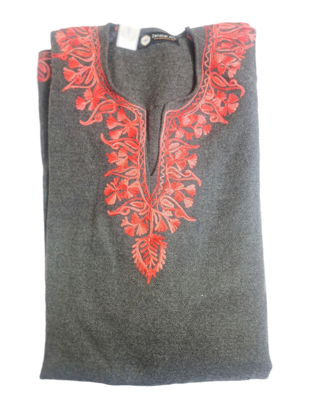Folded dark grey woolen kurta with intricate bright red floral embroidery around neckline from Zanskar Arts