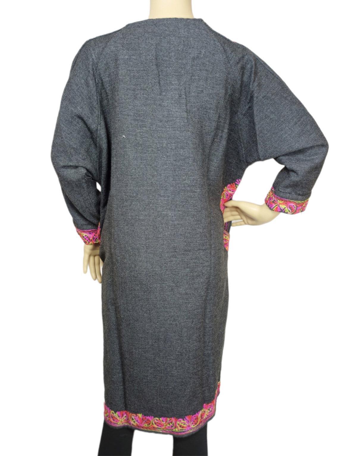Back view of grey long sleeve woolen kurti with pink and gold floral embroidery on cuffs and hem