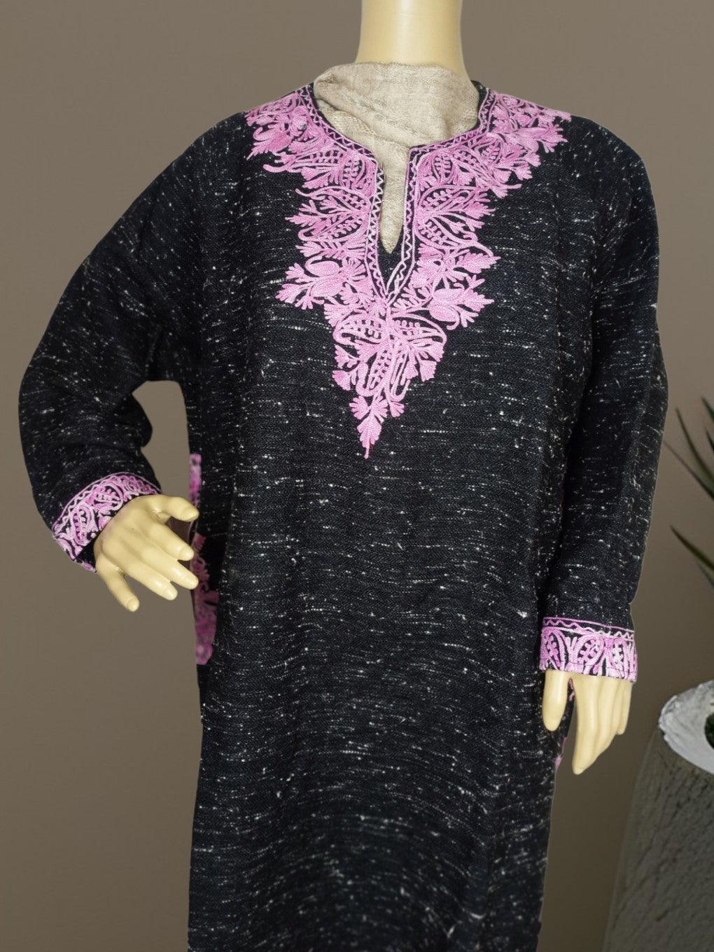 Black traditional kurta with pink floral embroidery on neckline and cuffs displayed on mannequin