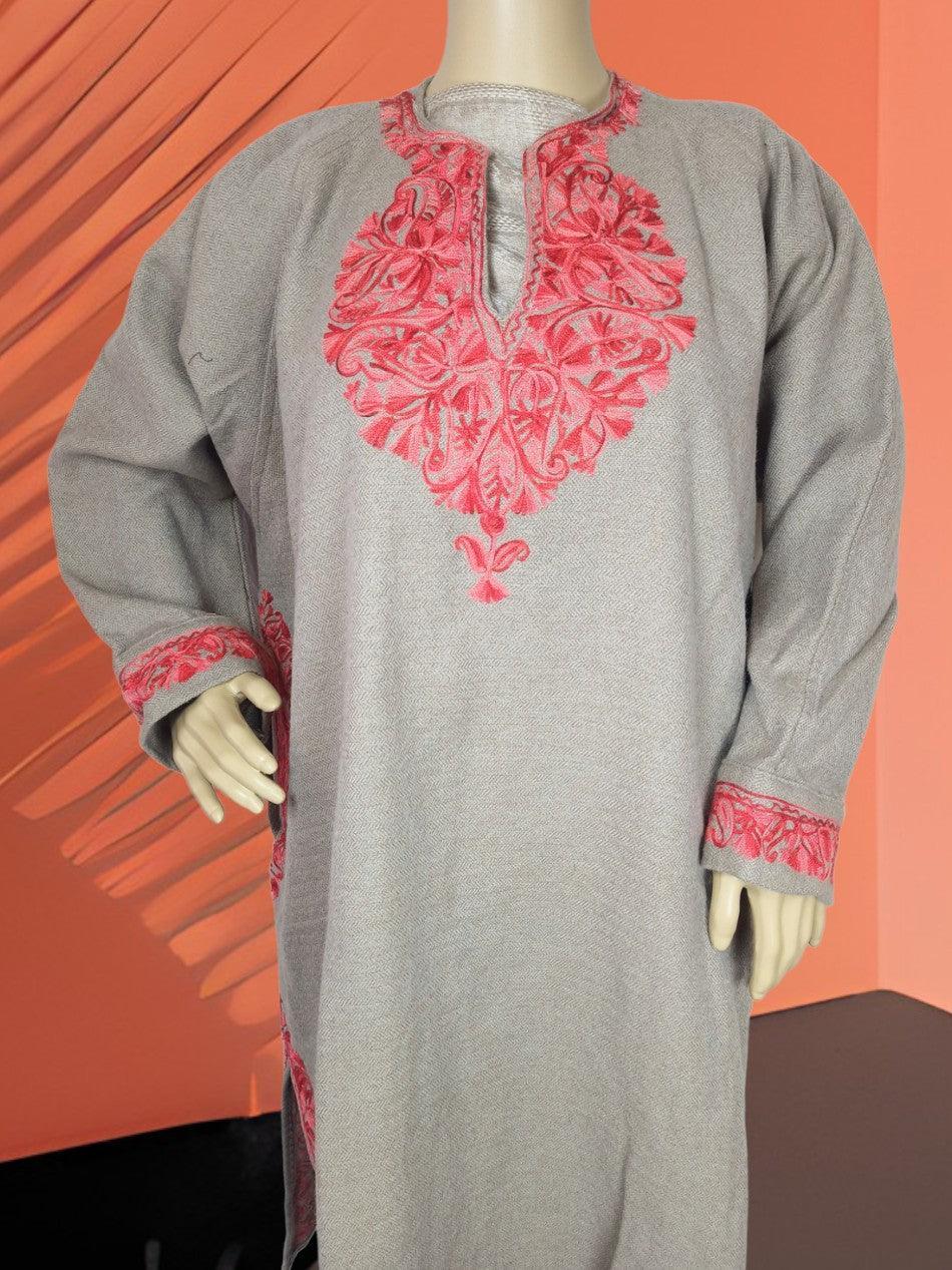 Gray traditional kurta with intricate pink embroidery on neckline and cuffs displayed on mannequin