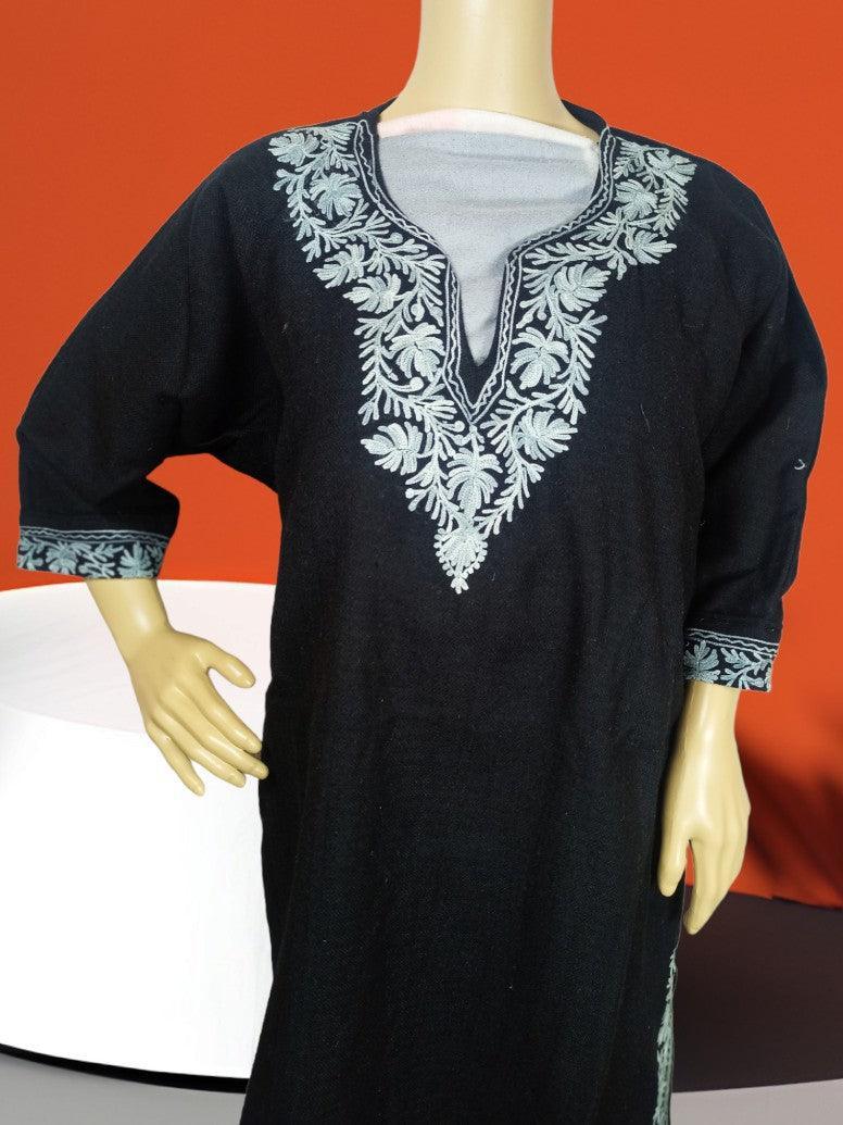 Black traditional embroidered kurta with white floral design on neckline and cuffs displayed on mannequin
