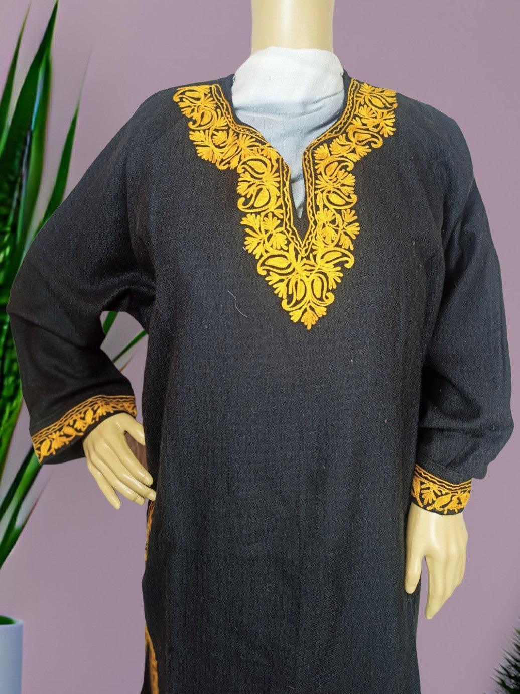 Black traditional garment with intricate yellow embroidery on neckline and cuffs displayed on mannequin