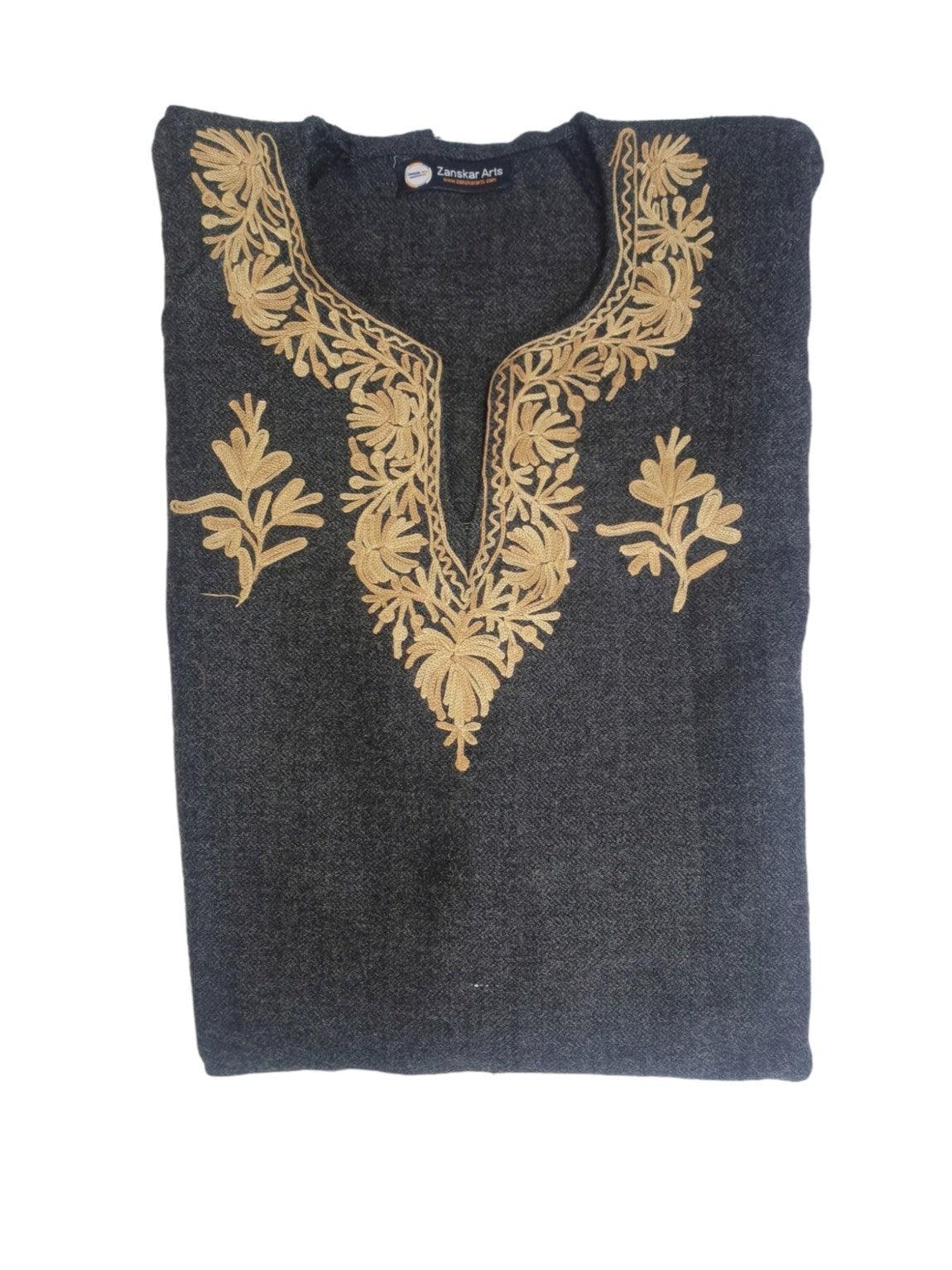 Folded dark grey pashmina shawl with intricate beige floral embroidery around neckline and sides from Zanskar Arts