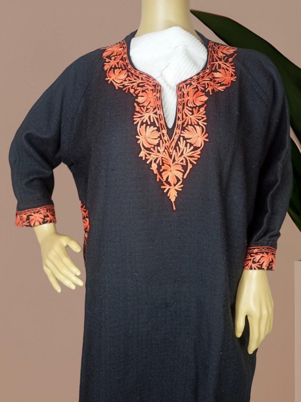 Black woolen kurta with intricate orange floral embroidery on neckline and cuffs displayed on mannequin
