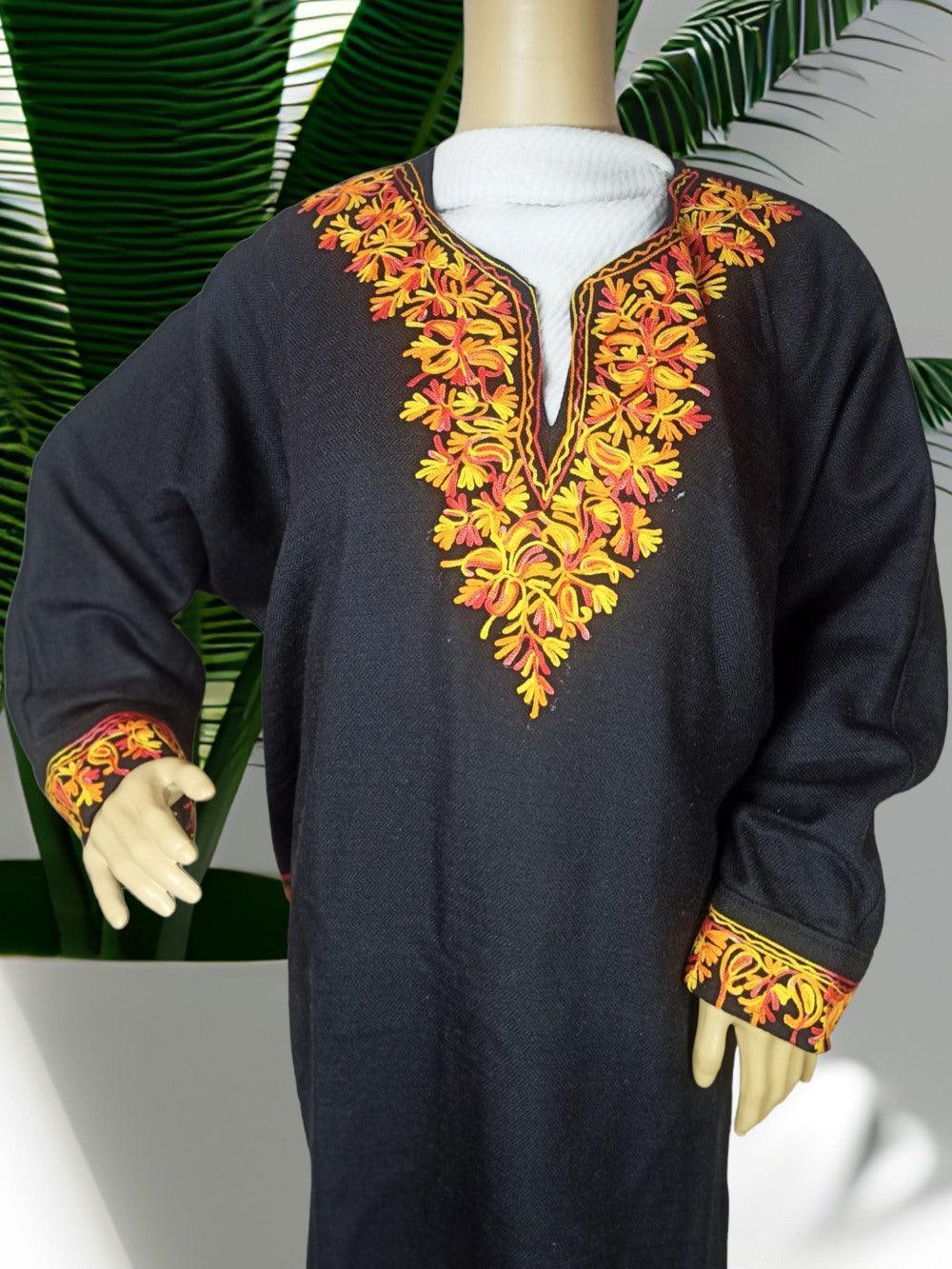 Black ethnic kurta with vibrant yellow and orange floral embroidery on neckline and cuffs displayed on mannequin