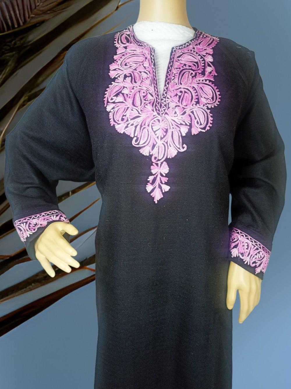 Black traditional ethnic dress with pink embroidery on neckline and cuffs displayed on mannequin