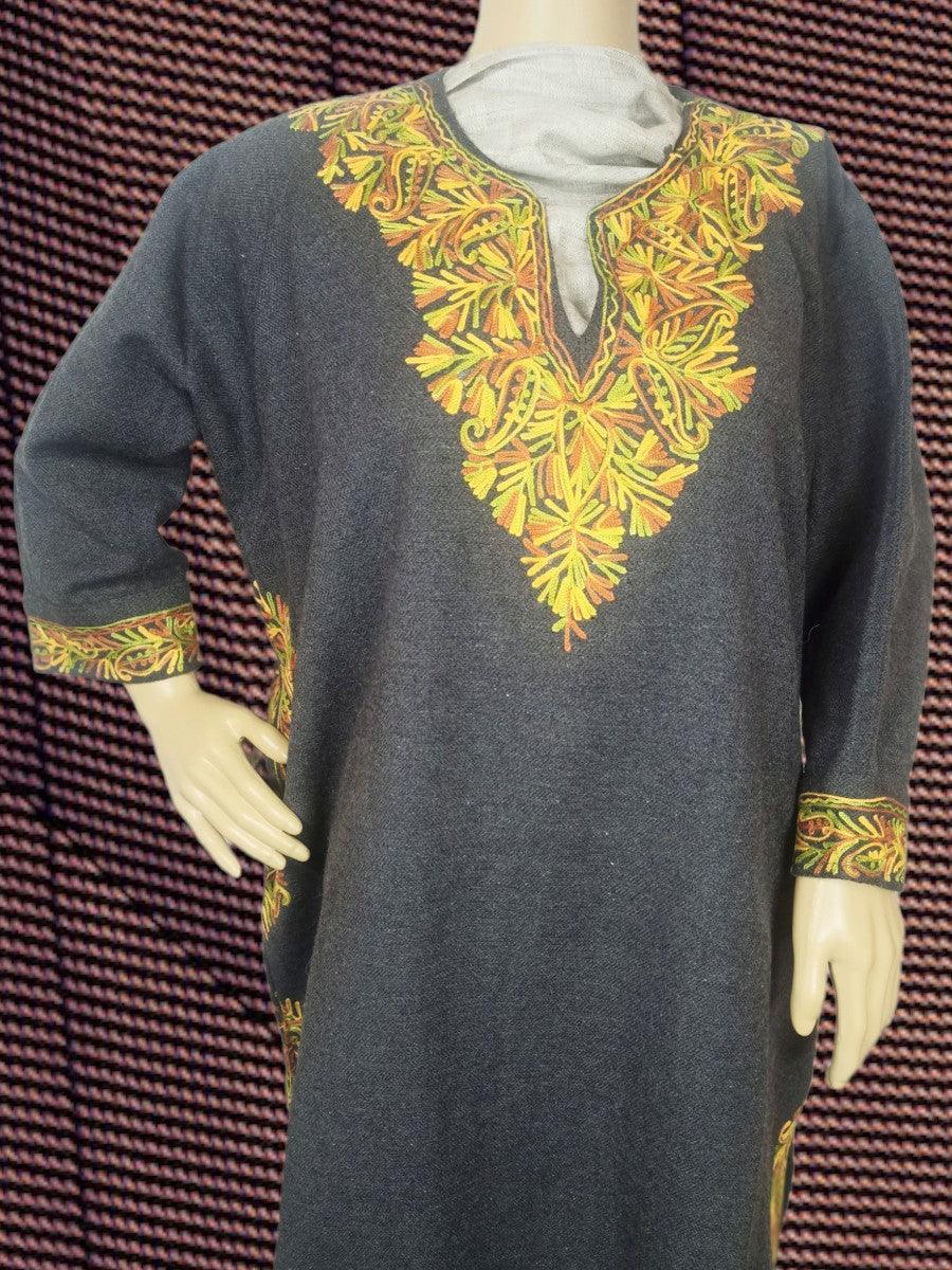Grey traditional dress with intricate yellow and orange floral embroidery on neckline and cuffs displayed on mannequin