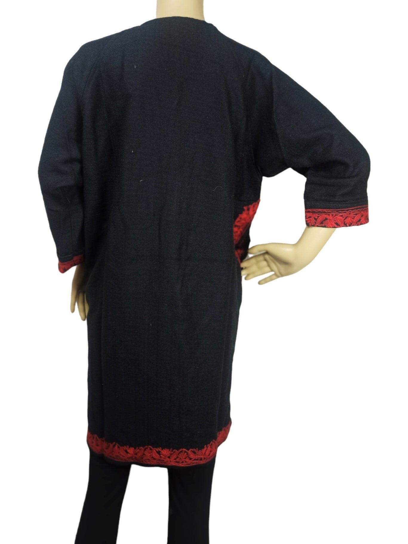 Back view of black kids yak wool faran pheran with red embroidered cuffs and hem from Zanskar Arts