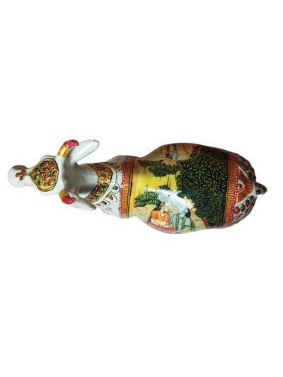 White metal desi cow sculpture with detailed traditional paper mache artwork, colorful and intricate design