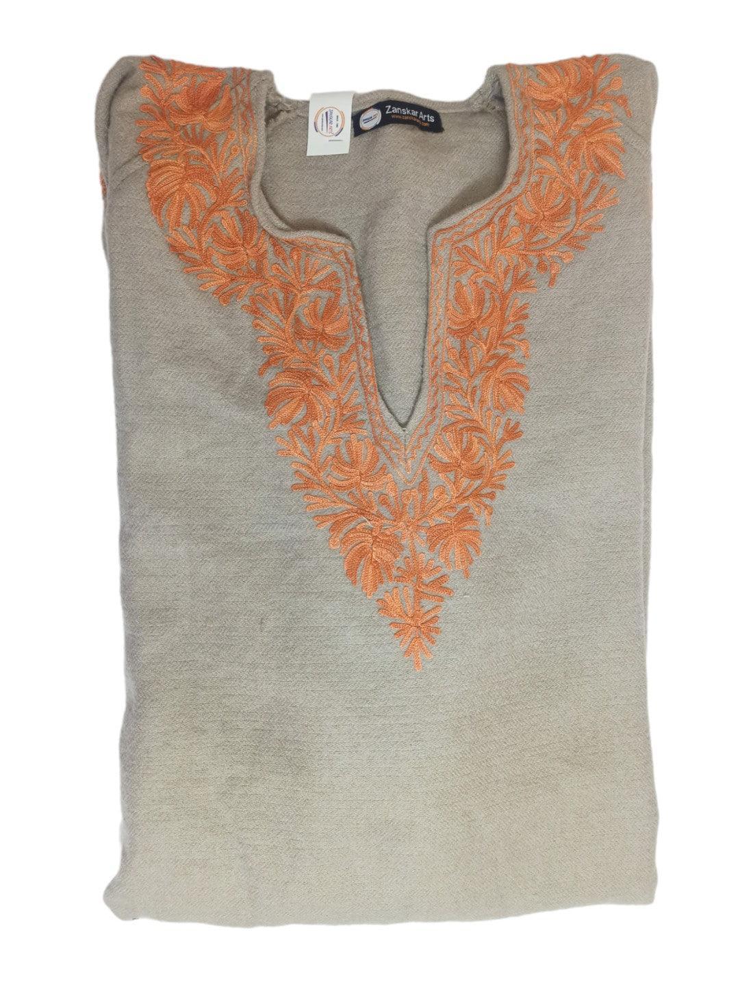 Folded cream women's yak wool kurta with orange floral embroidery on V-neck by Zanskar Arts