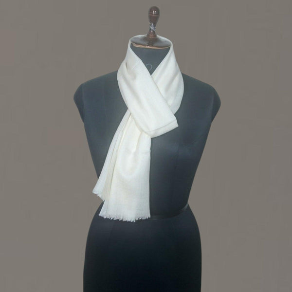 Plain white fine wool pashmina scarf displayed on black mannequin with wooden neck stand