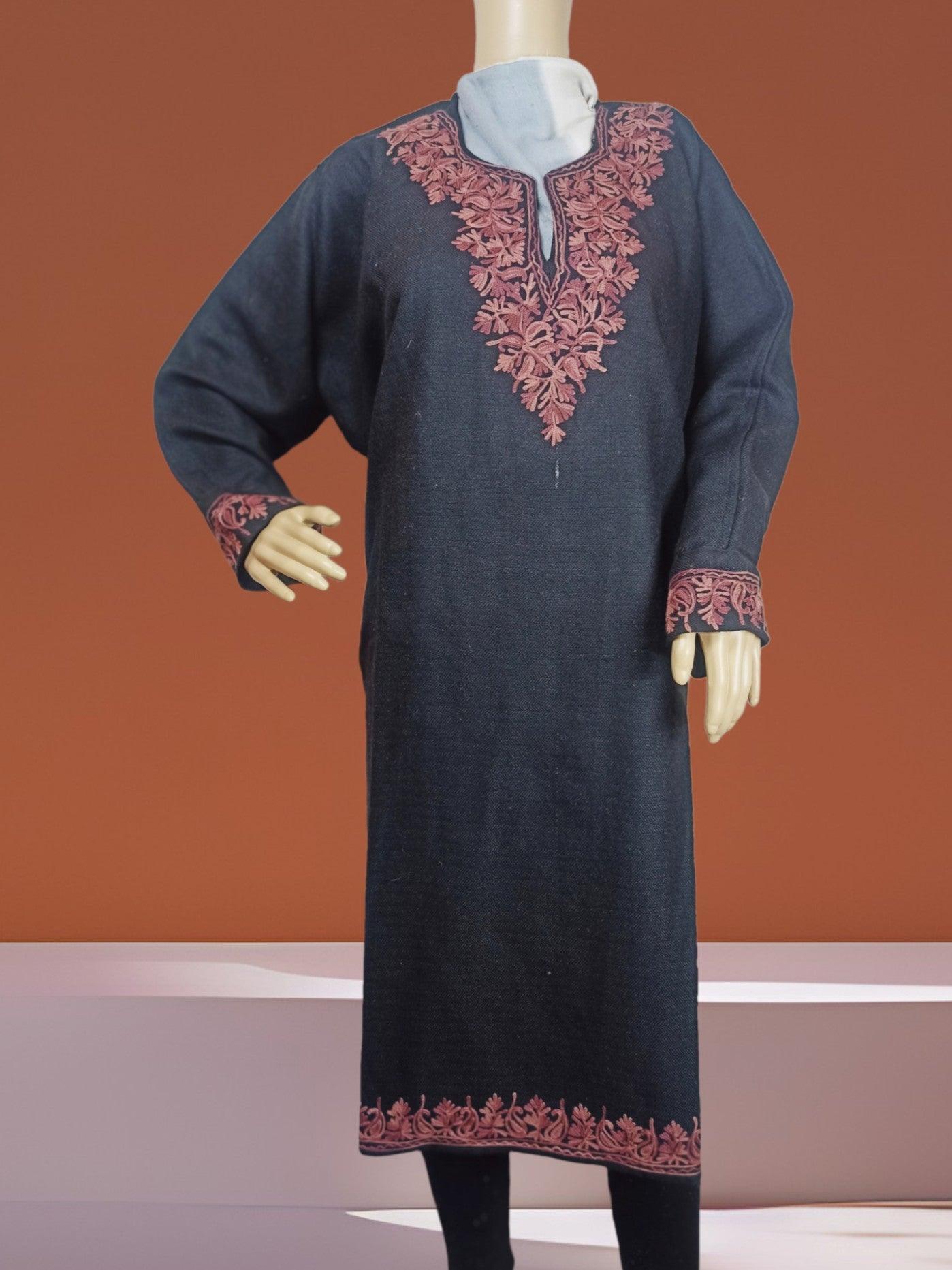 Black traditional dress with pink floral embroidery on neckline, cuffs, and hem displayed on mannequin