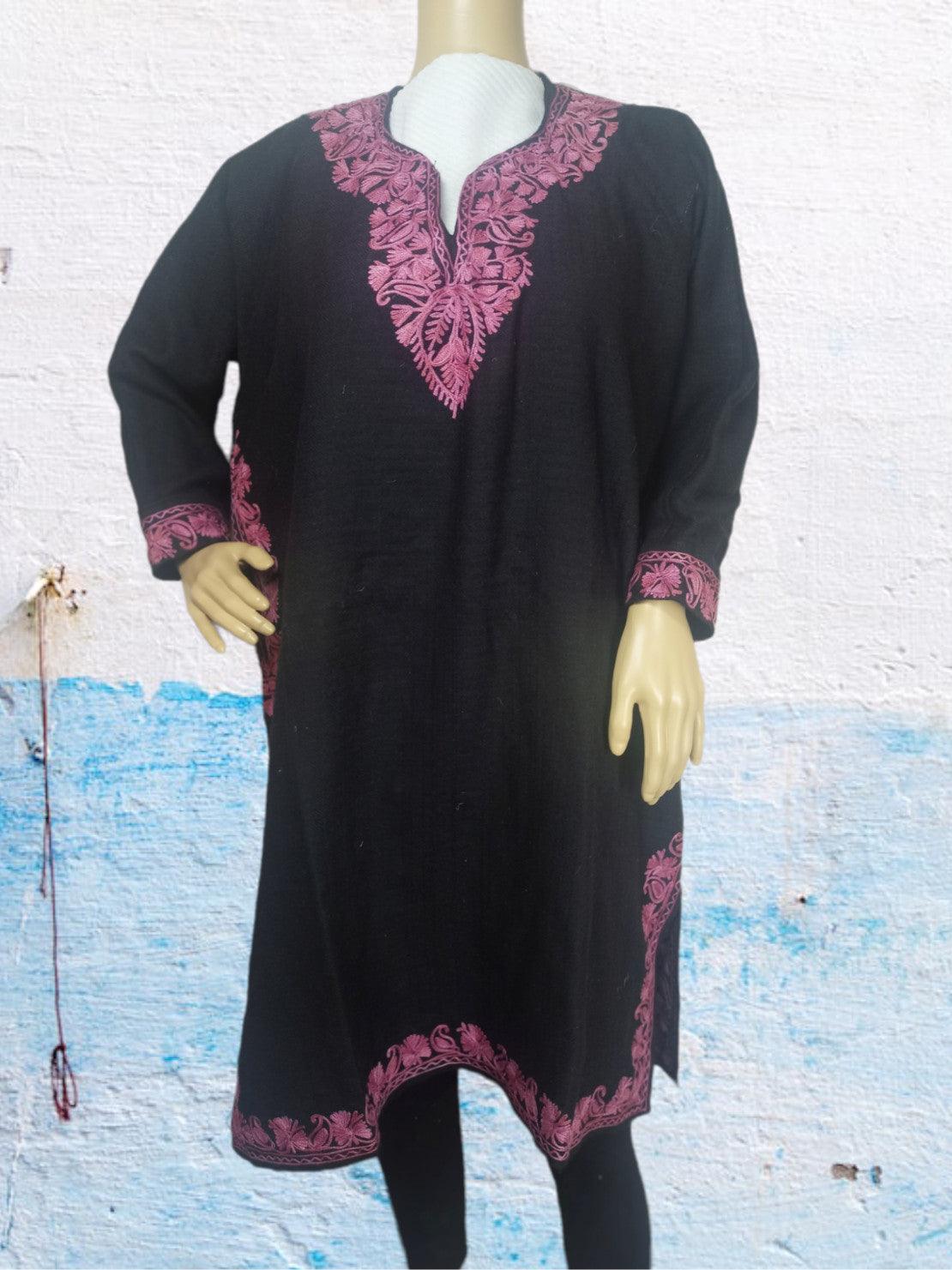 Black traditional kurta with pink floral embroidery on neckline, cuffs, hem, and sides displayed on mannequin