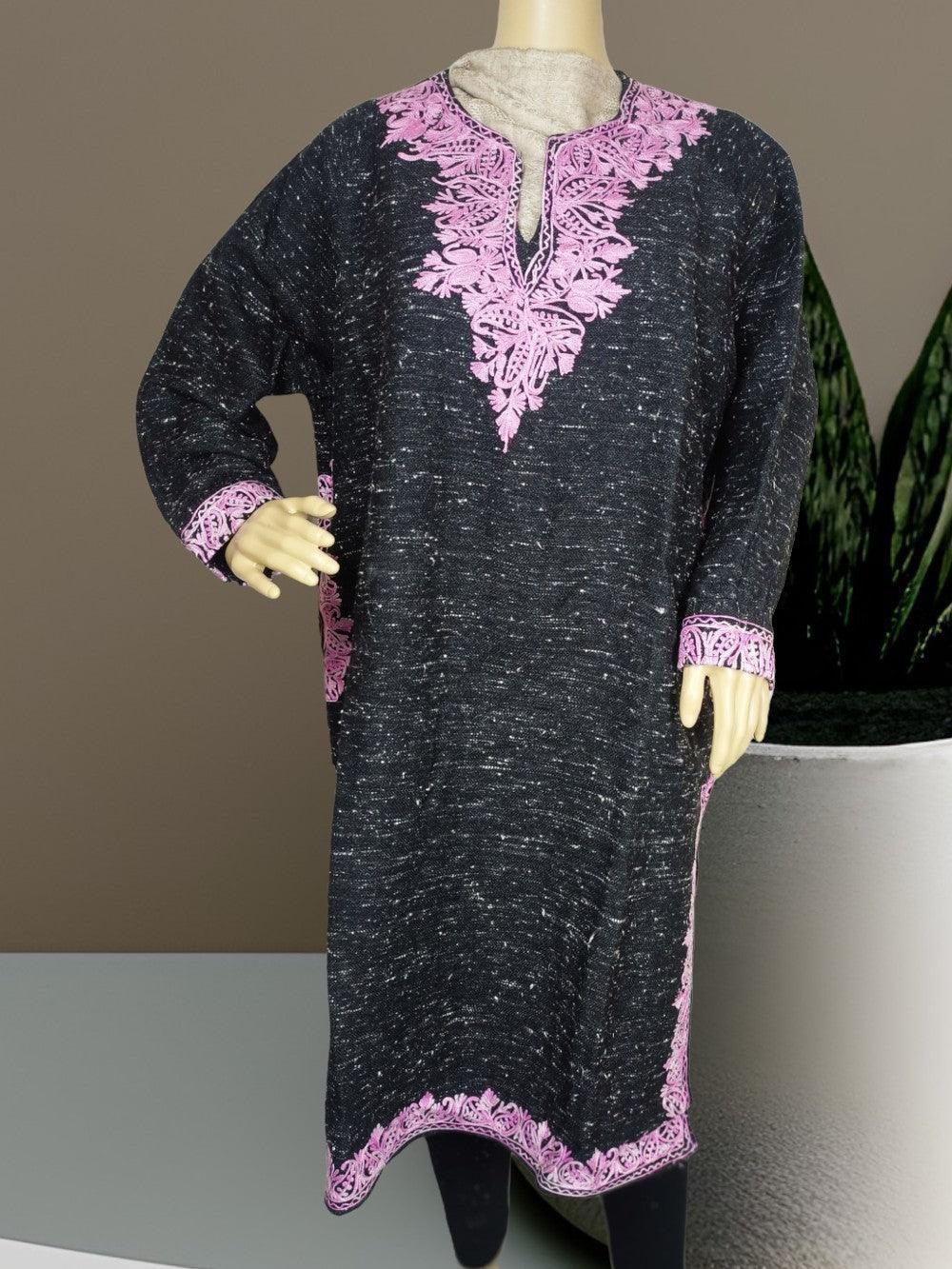 Black woolen traditional kurta with pink floral embroidery on neckline, cuffs, and hem displayed on mannequin