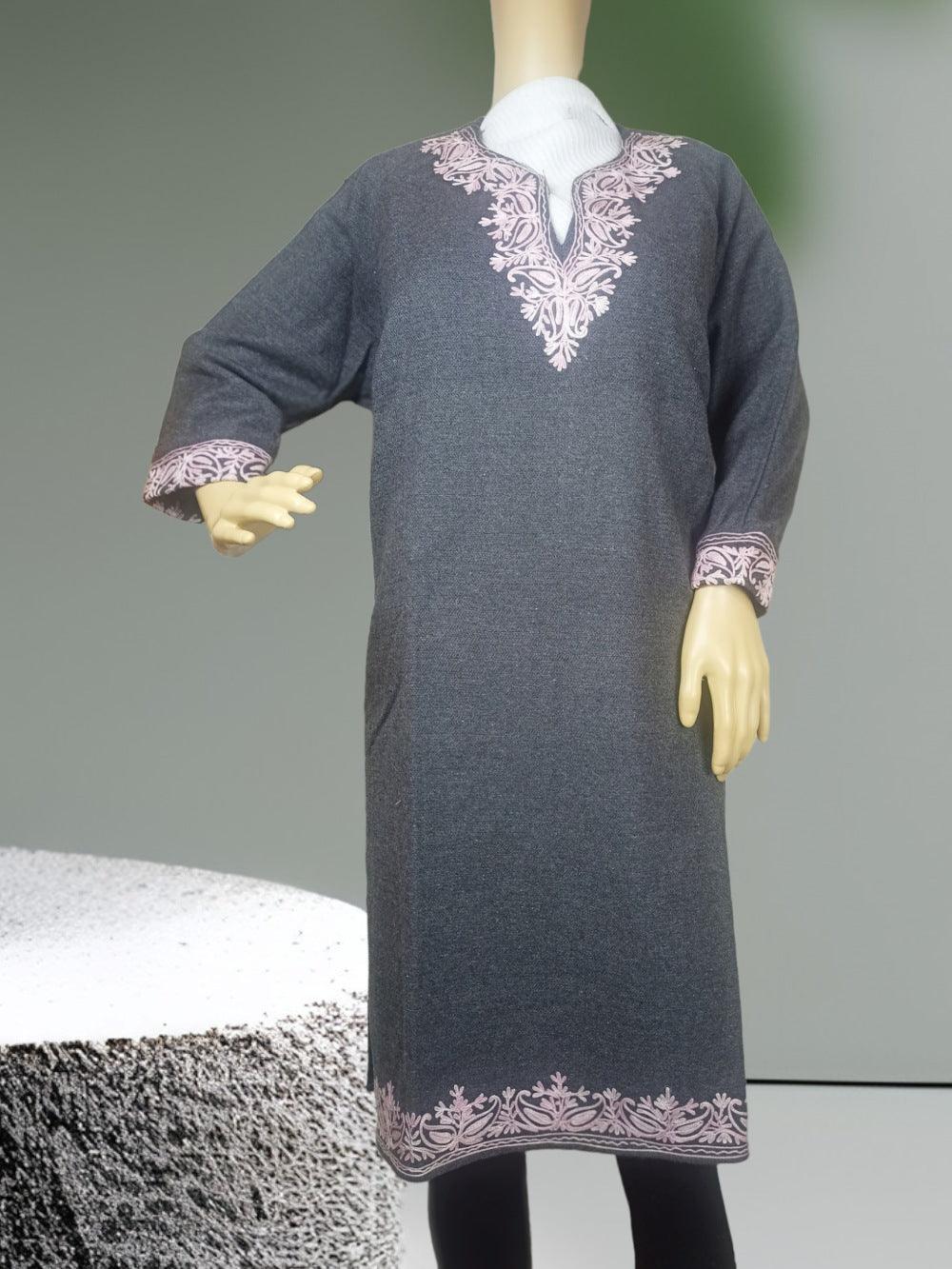 Gray woolen dress with pink floral embroidery on neckline, cuffs, and hem, displayed on mannequin